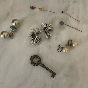 Earrings and gold pins from the 50s